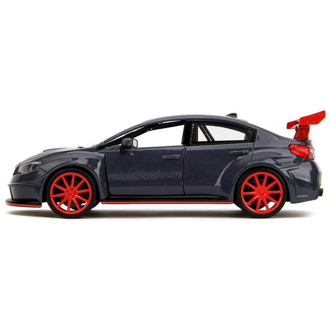 https://cdn.shopify.com/s/files/1/0504/9925/6496/files/2016-subaru-wrx-sti-widebody-dark-blue-and-yuji-itadori-diecast-figure-jujutsu-kaisen-20202023-tv-series-anime-hollywood-rides-series-124-diecast-model-car-by-j-985030.jpg?v=1748403939