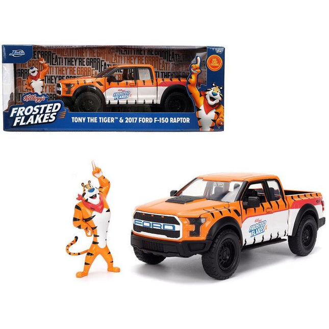 https://cdn.shopify.com/s/files/1/0504/9925/6496/files/2017-ford-f-150-raptor-pickup-truck-frosted-flakes-orange-with-graphics-and-tony-the-tiger-diecast-figure-hollywood-rides-series-124-diecast-model-car-by-jada-971513.jpg?v=1756087132