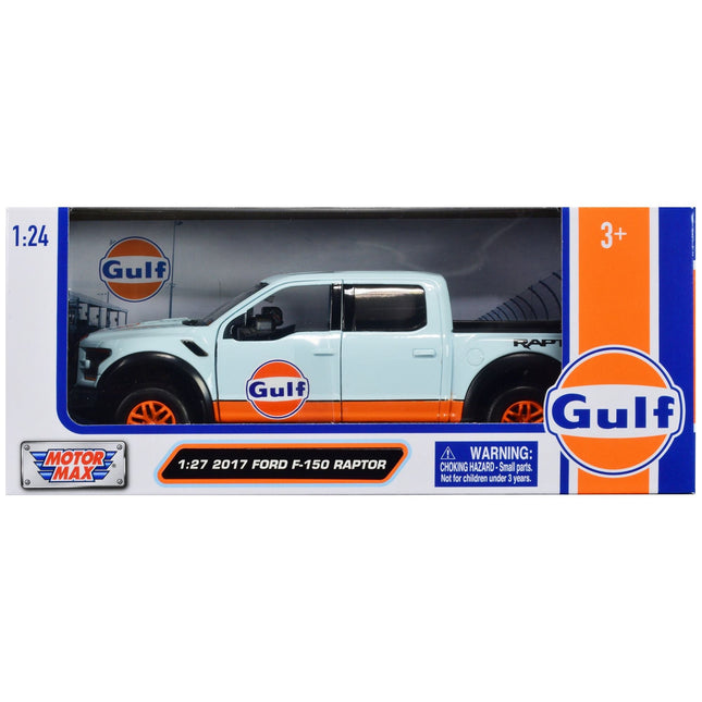 https://cdn.shopify.com/s/files/1/0504/9925/6496/files/2017-ford-f-150-raptor-pickup-truck-light-blue-with-orange-stripes-gulf-oil-gulf-die-cast-collection-127-diecast-model-car-by-motormax-975768.jpg?v=1748417973