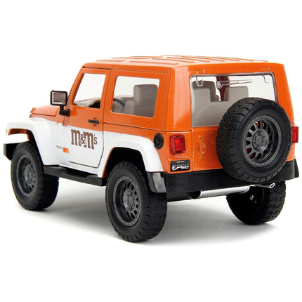 https://cdn.shopify.com/s/files/1/0504/9925/6496/files/2017-jeep-wrangler-orange-metallic-and-white-and-orange-mm-diecast-figure-mms-hollywood-rides-series-124-diecast-model-car-by-jada-317169.jpg?v=1748419129