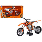 https://cdn.shopify.com/s/files/1/0504/9925/6496/files/2018-ktm-450-sx-f-dirt-bike-motorcycle-orange-and-white-16-diecast-model-by-new-ray-518045.jpg?v=1760624532