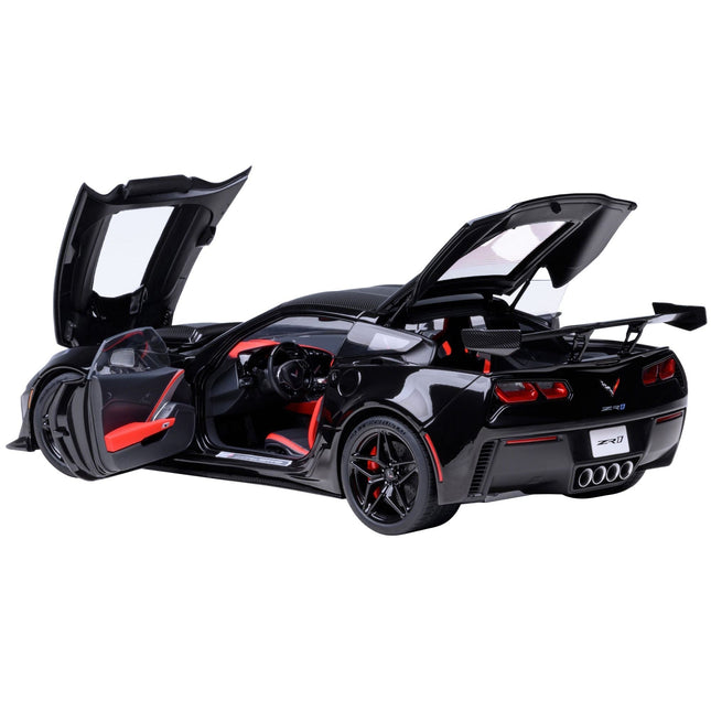 https://cdn.shopify.com/s/files/1/0504/9925/6496/files/2019-chevrolet-corvette-c7-zr1-black-with-carbon-top-118-model-car-by-autoart-734534.jpg?v=1756087043