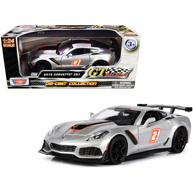 https://cdn.shopify.com/s/files/1/0504/9925/6496/files/2019-chevrolet-corvette-zr1-2-silver-with-black-and-orange-stripes-gt-racing-series-124-diecast-model-car-by-motormax-253508.jpg?v=1748418083