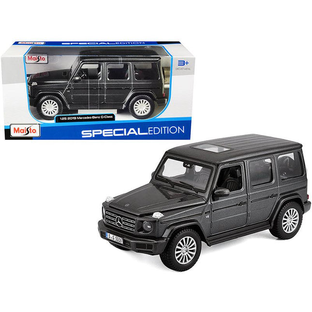 https://cdn.shopify.com/s/files/1/0504/9925/6496/files/2019-mercedes-benz-g-class-with-sunroof-dark-gray-metallic-125-diecast-model-car-by-maisto-787760.jpg?v=1748418492