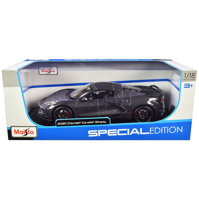 https://cdn.shopify.com/s/files/1/0504/9925/6496/files/2020-chevrolet-corvette-stingray-c8-dark-gray-metallic-with-racing-stripes-118-diecast-model-car-by-maisto-329925.jpg?v=1748418490