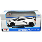 https://cdn.shopify.com/s/files/1/0504/9925/6496/files/2020-chevrolet-corvette-stingray-coupe-white-with-black-stripes-special-edition-series-124-diecast-model-car-by-maisto-106801.jpg?v=1748418495