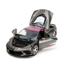 https://cdn.shopify.com/s/files/1/0504/9925/6496/files/2020-chevrolet-corvette-stingray-gray-metallic-with-pink-carbon-hood-and-top-pink-slips-series-124-diecast-model-car-by-jada-582337.jpg?v=1748419129