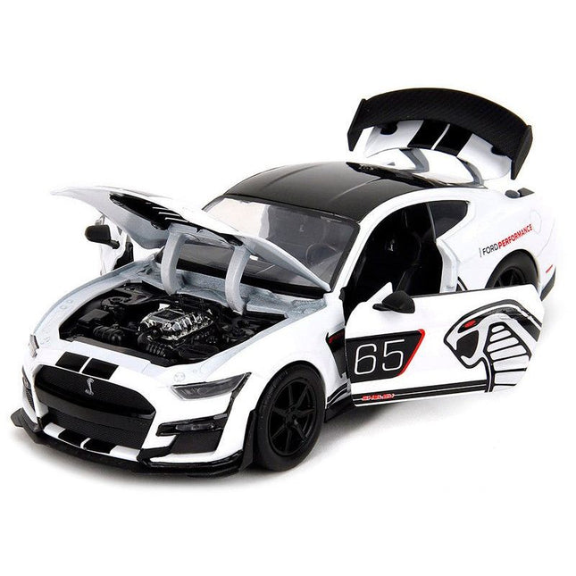 https://cdn.shopify.com/s/files/1/0504/9925/6496/files/2020-ford-mustang-shelby-gt500-65-white-with-black-top-and-stripes-ford-performance-bigtime-muscle-series-124-diecast-model-car-by-jada-229152.jpg?v=1756087289