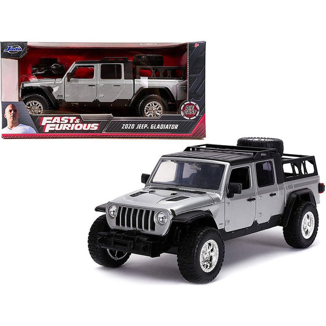 https://cdn.shopify.com/s/files/1/0504/9925/6496/files/2020-jeep-gladiator-pickup-truck-silver-with-black-top-fast-furious-series-124-diecast-model-car-by-jada-132892.jpg?v=1748419548