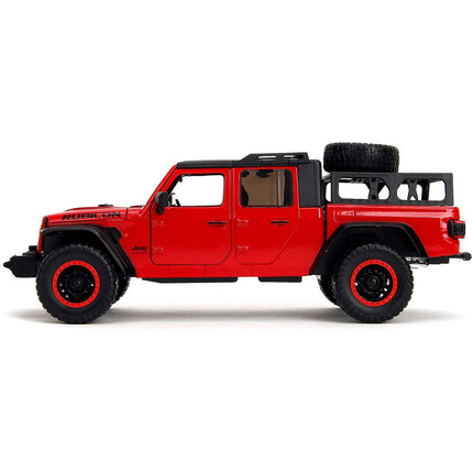 https://cdn.shopify.com/s/files/1/0504/9925/6496/files/2020-jeep-gladiator-rubicon-pickup-truck-red-with-black-top-and-extra-wheels-just-trucks-series-124-diecast-model-car-by-jada-916275.jpg?v=1748403841