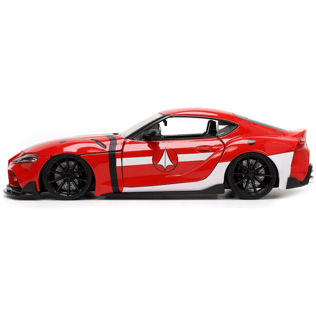 https://cdn.shopify.com/s/files/1/0504/9925/6496/files/2020-toyota-supra-red-with-graphics-and-miriya-sterling-diecast-figurine-robotech-hollywood-rides-series-124-diecast-model-car-by-jada-771090.jpg?v=1748419130