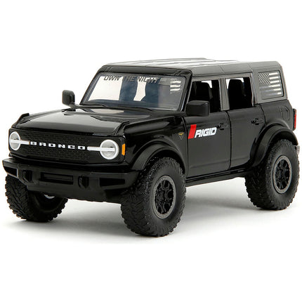 https://cdn.shopify.com/s/files/1/0504/9925/6496/files/2021-ford-bronco-badlands-black-rigid-with-extra-wheels-just-trucks-series-124-diecast-model-car-by-jada-458946.jpg?v=1748405105