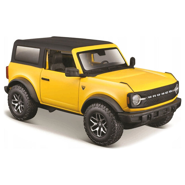 https://cdn.shopify.com/s/files/1/0504/9925/6496/files/2021-ford-bronco-badlands-yellow-with-black-top-special-edition-124-diecast-model-car-by-maisto-815444.jpg?v=1748403383