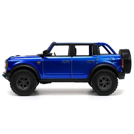 https://cdn.shopify.com/s/files/1/0504/9925/6496/files/2021-ford-bronco-open-top-candy-blue-metallic-with-extra-wheels-just-trucks-series-124-diecast-model-car-by-jada-867851.jpg?v=1756087218