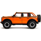 https://cdn.shopify.com/s/files/1/0504/9925/6496/files/2021-ford-bronco-open-top-orange-with-black-stripes-and-hood-with-extra-wheels-just-trucks-series-124-diecast-model-car-by-jada-818483.jpg?v=1748403838