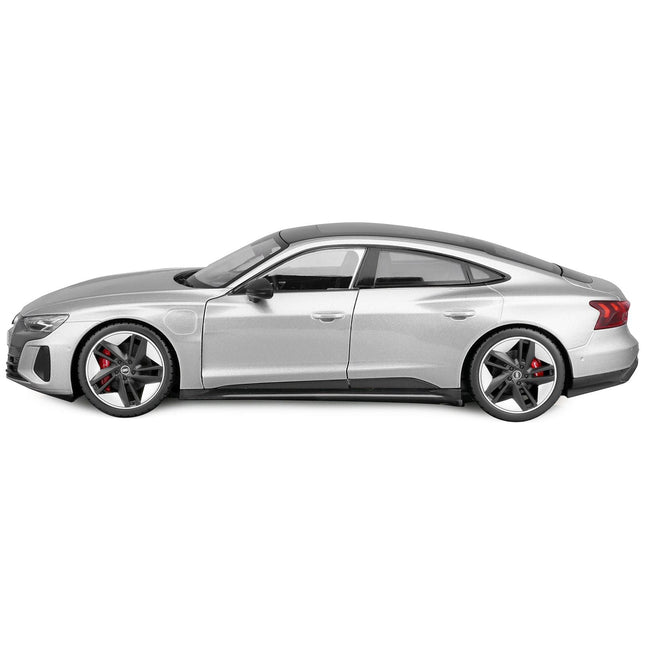 https://cdn.shopify.com/s/files/1/0504/9925/6496/products/2022-audi-rs-e-tron-gt-silver-metallic-with-sunroof-118-diecast-model-car-by-bburago-110997.jpg?v=1748421308