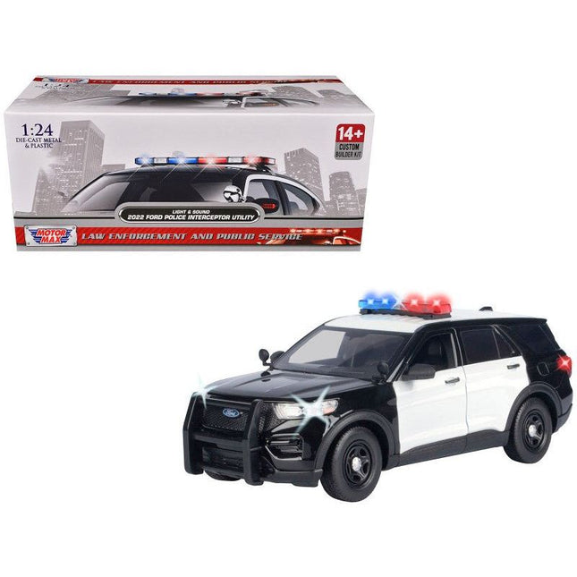 https://cdn.shopify.com/s/files/1/0504/9925/6496/files/2022-ford-police-interceptor-utility-black-and-white-builders-kit-with-flashing-light-bar-and-front-and-rear-lights-and-sounds-124-diecast-model-car-by-motormax-717139.jpg?v=1756087109