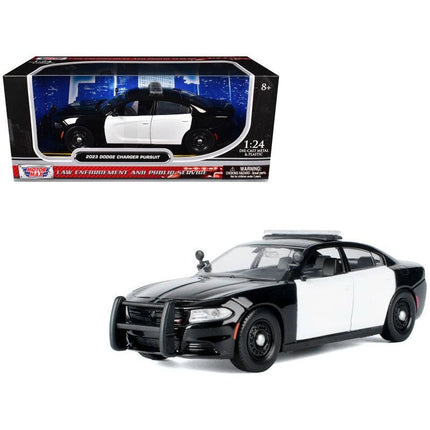 https://cdn.shopify.com/s/files/1/0504/9925/6496/files/2023-dodge-charger-pursuit-police-car-black-and-white-law-enforcement-and-public-service-series-124-diecast-model-car-by-motormax-951881.jpg?v=1756086897