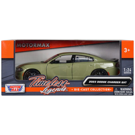 https://cdn.shopify.com/s/files/1/0504/9925/6496/files/2023-dodge-charger-sxt-green-metallic-timeless-legends-series-124-diecast-model-car-by-motormax-476526.jpg?v=1748405788
