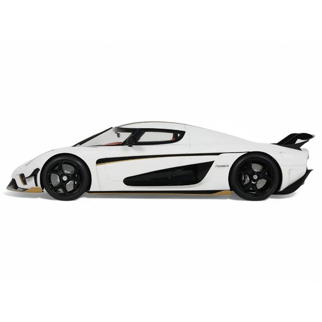https://cdn.shopify.com/s/files/1/0504/9925/6496/files/2023-koenigsegg-regera-white-with-black-stripes-118-model-car-by-gt-spirit-498918.jpg?v=1756087027
