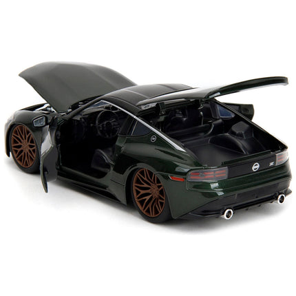 https://cdn.shopify.com/s/files/1/0504/9925/6496/files/2023-nissan-z-dark-green-metallic-with-black-top-fast-x-2023-movie-fast-furious-series-124-diecast-model-car-by-jada-210413.jpg?v=1748419023
