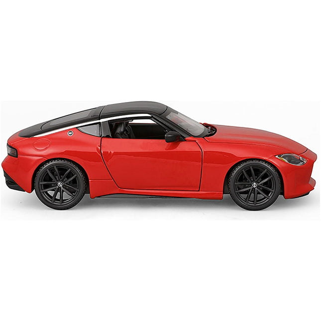https://cdn.shopify.com/s/files/1/0504/9925/6496/files/2023-nissan-z-red-with-black-top-special-edition-series-124-diecast-model-car-by-maisto-764231.jpg?v=1748405106