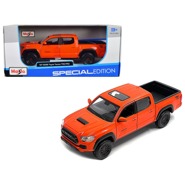 https://cdn.shopify.com/s/files/1/0504/9925/6496/files/2023-toyota-tacoma-trd-pro-pickup-truck-solar-octane-orange-with-sunroof-special-edition-series-127-diecast-model-car-by-maisto-329091.jpg?v=1748405263