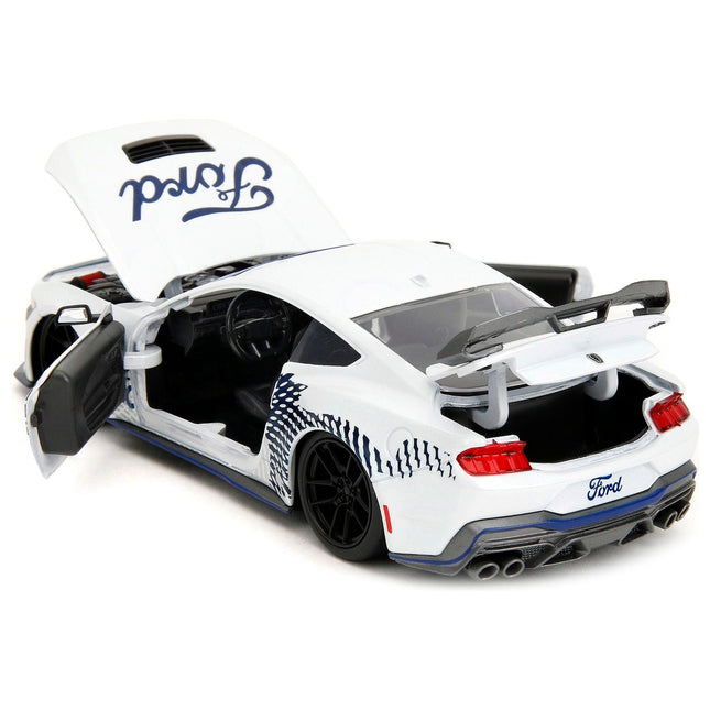 https://cdn.shopify.com/s/files/1/0504/9925/6496/files/2024-ford-mustang-dark-house-white-with-mustang-horse-graphics-bigtime-muscle-series-124-diecast-model-car-by-jada-855456.jpg?v=1748419008