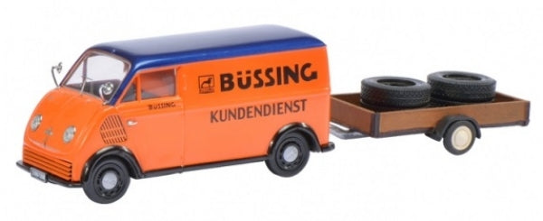 Orange and blue Büssing Kundendienst model van with trailer carrying two spare tires