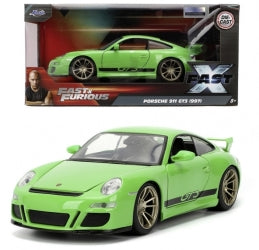 Green Porsche 911 GT3 RS diecast model car with Fast X packaging, 1:24 scale.