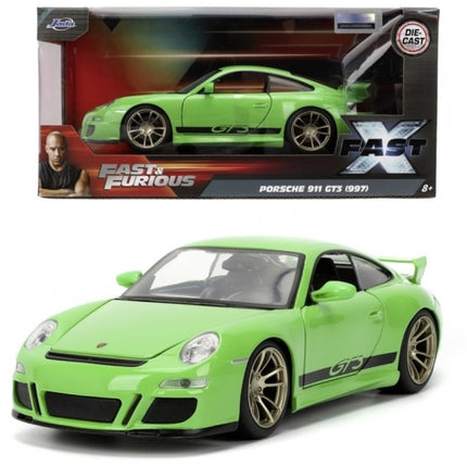 Green Porsche 911 GT3 997 diecast model car from Fast X, 1:24 scale, in retail box.