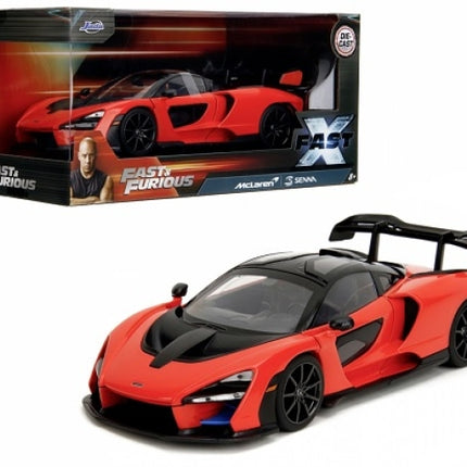 Diecast model McLaren Senna in red and black with Fast & Furious X packaging, 1:24 scale.
