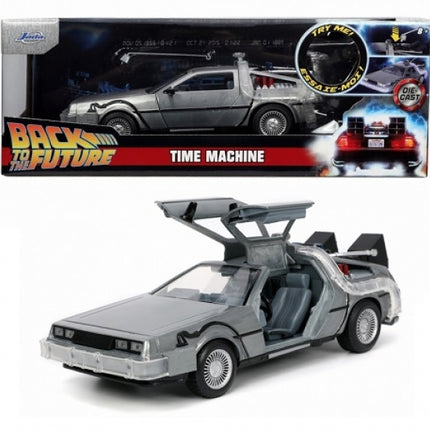 Diecast Back to the Future DeLorean model car with gullwing doors open, detailed interior