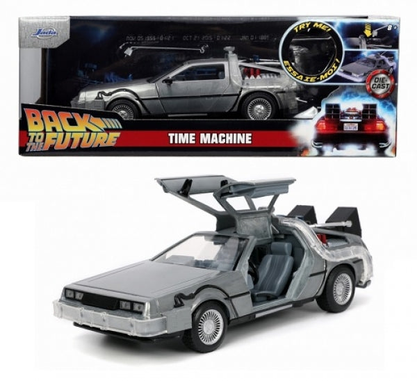 Diecast Back to the Future DeLorean model car with gullwing doors open, detailed interior