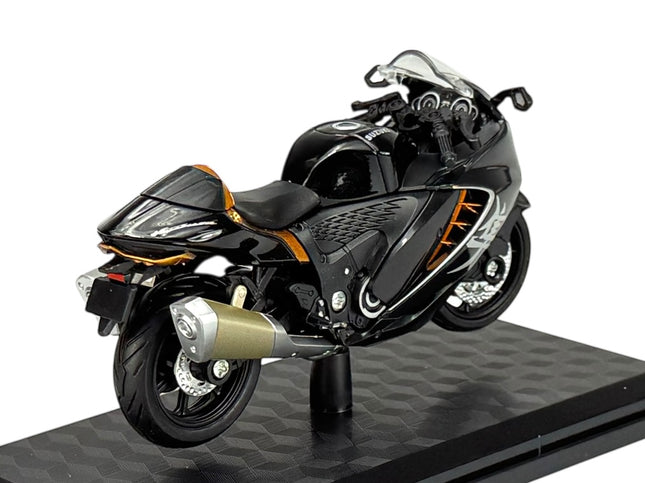 1:18 scale black diecast model sport motorcycle with orange accents on display stand