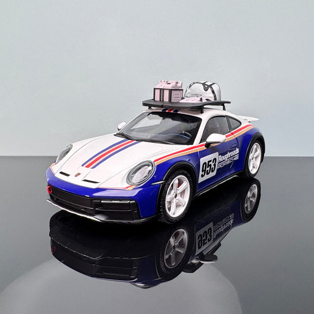 Minichamps Porsche 911 Dakar Blue and White 1:18 Diecast Model Car - studio product photo of the scale model