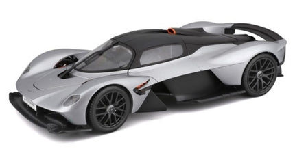 Silver and black diecast model hypercar with aerodynamic design and detailed wheels