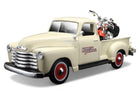 Diecast model vintage cream pickup truck with Harley-Davidson motorcycle in truck bed