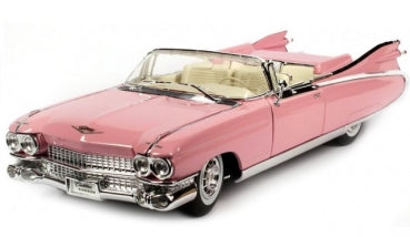 Pink classic convertible diecast model car with detailed chrome accents and white interior