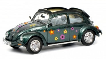 Diecast model green Volkswagen Beetle with colorful flower decals, 1:18 scale