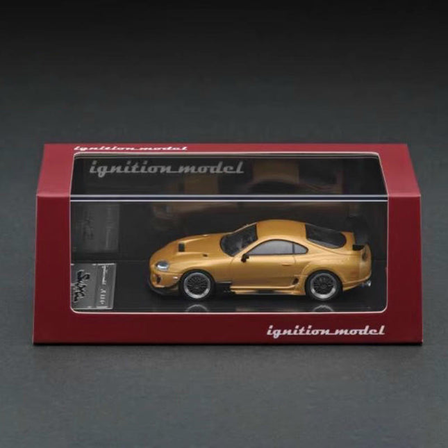 Ignition Model Toyota Supra JZA80 RZ Gold 1:64 Diecast Model Car - studio product photo of the scale model