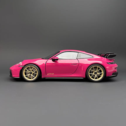Norev Porsche 911 GT3 Rose Red 1:18 Diecast Model Car - studio product photo of the scale model