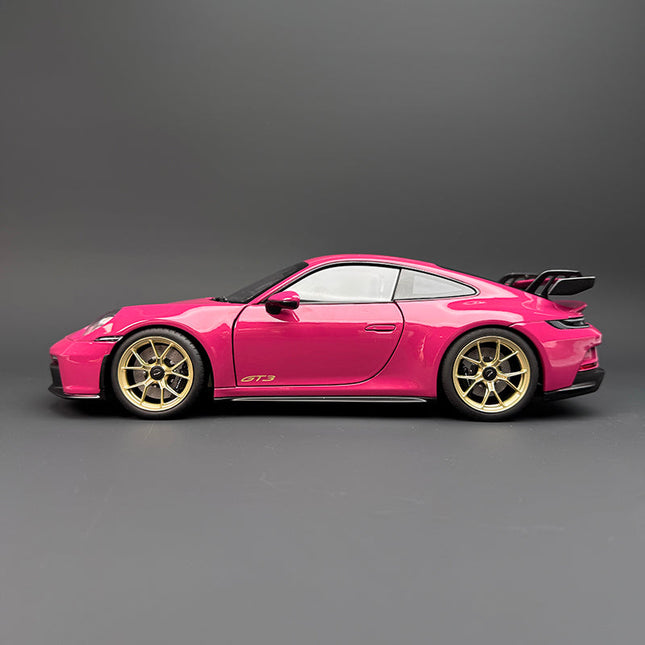 Norev Porsche 911 GT3 Rose Red 1:18 Diecast Model Car - studio product photo of the scale model