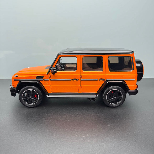 Almost Real Mercedes-Benz G63 2017 Orange 1:18 Diecast Model Car - studio product photo of the scale model