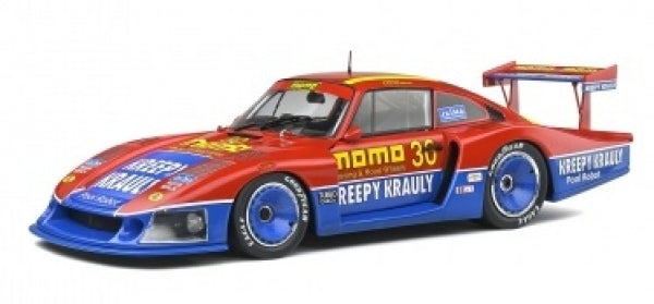 1:18 scale red and blue diecast race car model with detailed sponsor decals and rear wing