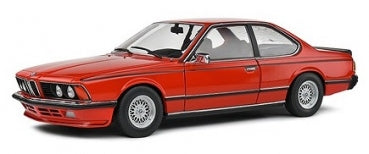 Red 1:18 scale diecast BMW model car, classic coupe design, detailed wheels and trim