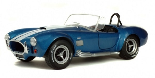 Blue 1:18 scale diecast classic sports car model with white racing stripes, silver rims, and open top.