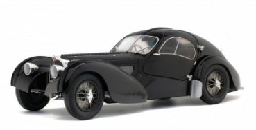 1:18 scale black vintage diecast model car with detailed design and classic curves