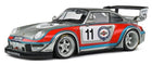 1:18 scale diecast Porsche race car model with silver, red, and blue livery, number 11