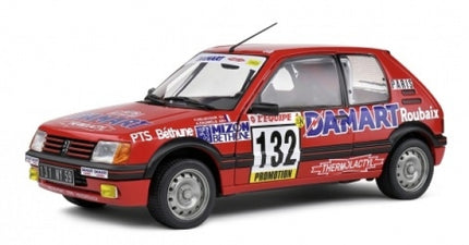 1:18 scale diecast Peugeot 205 rally car model, red with racing decals and number 132.
